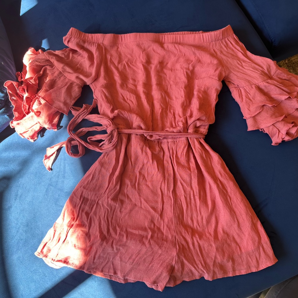 Rosy pink romper with fringe arms size small